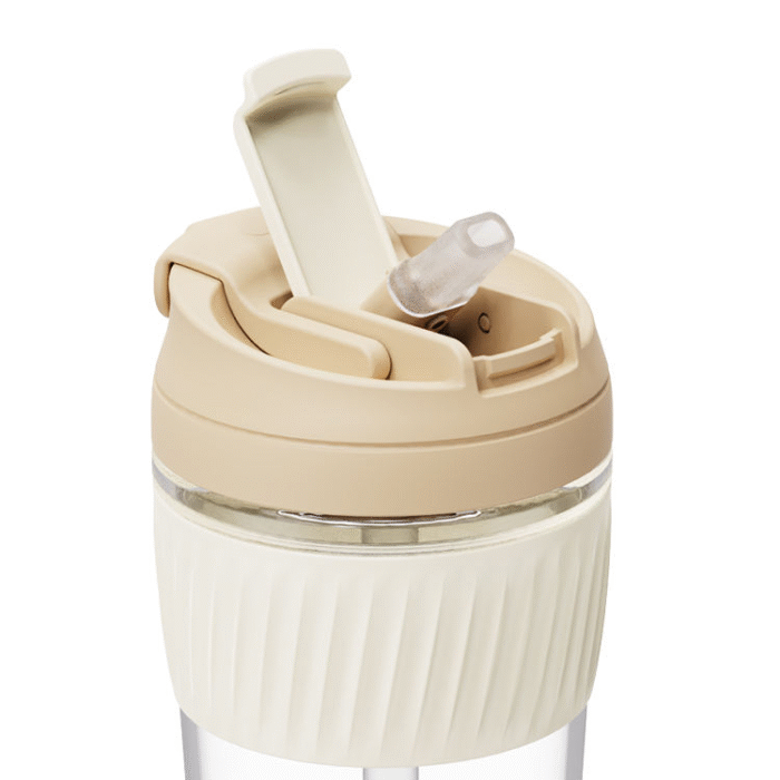Glass cup with lid and straw
